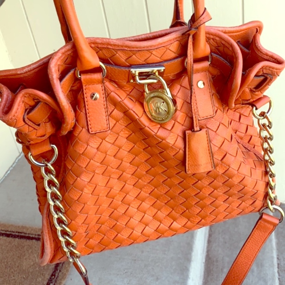 Michael Kors leather purse in orange